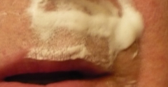 11427